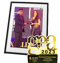 Hon. MD. of NatureWings Holidays Ltd. Mr. Sandip Raha is receiving the Best National Tourism Company Award from Bollywood Glamour Queen Madhuri Dixit Nene at GEA & Convention 2023, Hotel Sahara Star, Mumbai