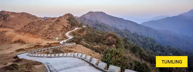 tumling as seen beautiful with the concrete road on the way to sandakphu trekking from Bagdogra booked from NatureWings